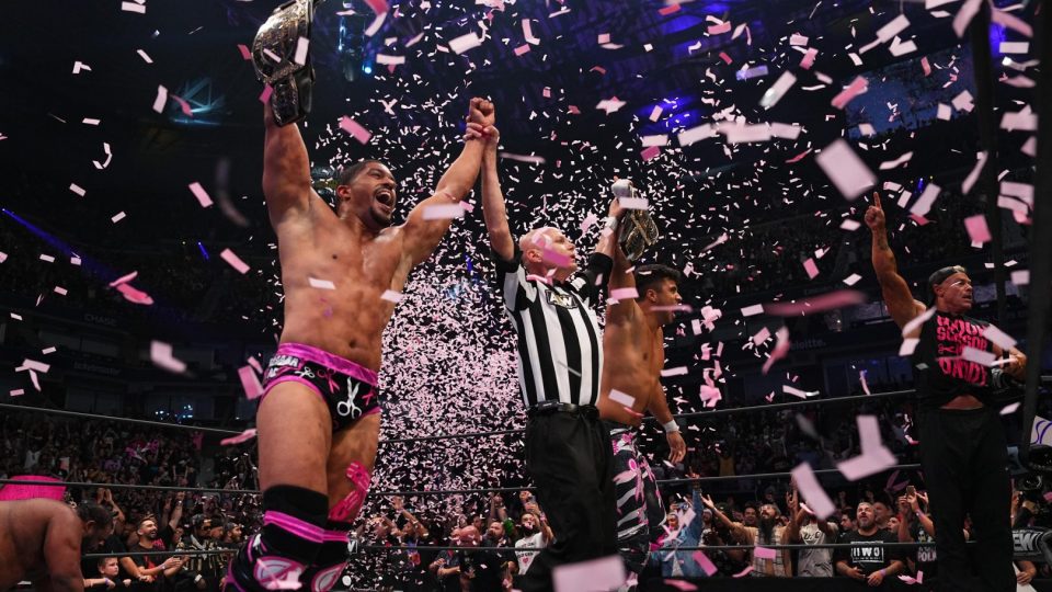 The Acclaimed Max Caster Anthony Bowens celebrate with AEW World Tag Team Titles on AEW Grand Slam Dynamite 2022