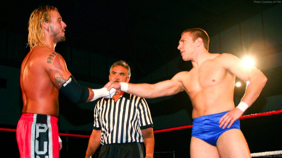 CM Punk shakes hands with Bryan Danielson in Ring of Honor.