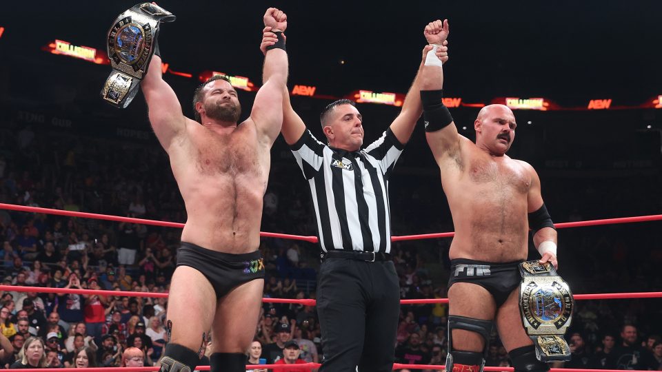 FTR celebrating a successful AEW tag title defence on AEW Collision