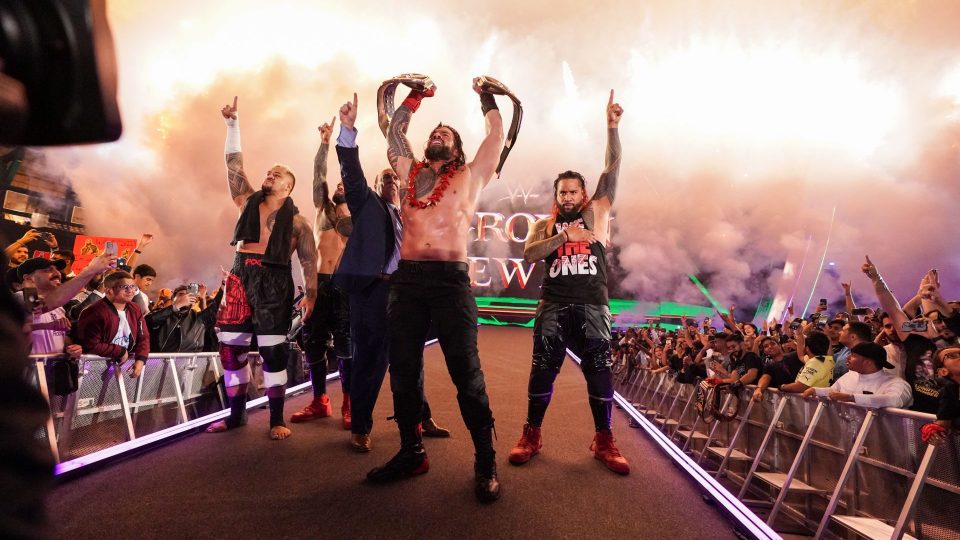 The Bloodline Roman Reigns Paul Heyman Solo Sikoa The Usos Jey Uso Jimmy Uso celebrate at WWE Crown Jewel 2022