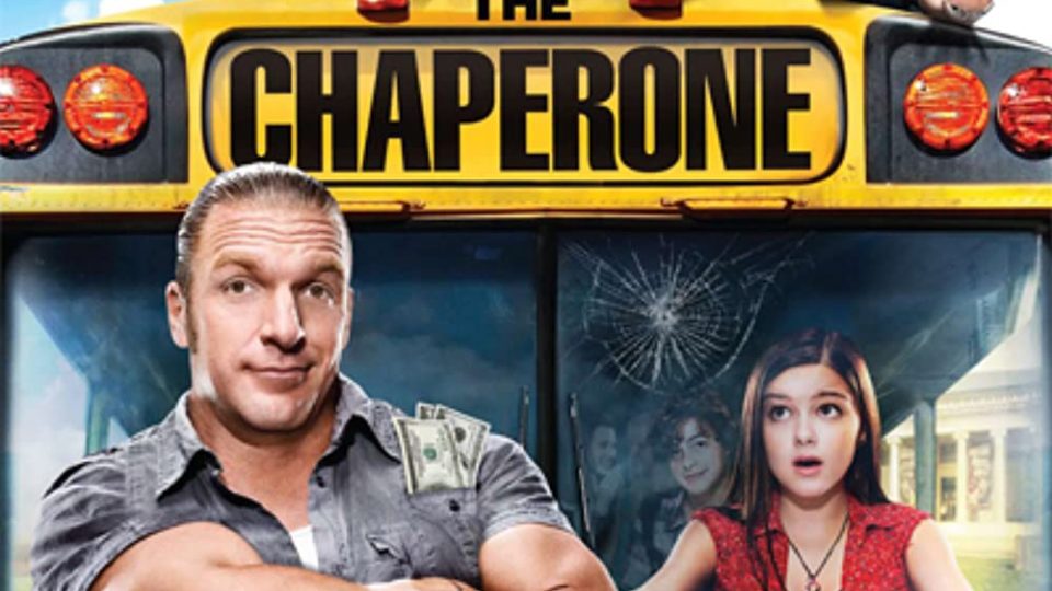 Triple H looks awkward in front of school bus in The Chaperone poster.