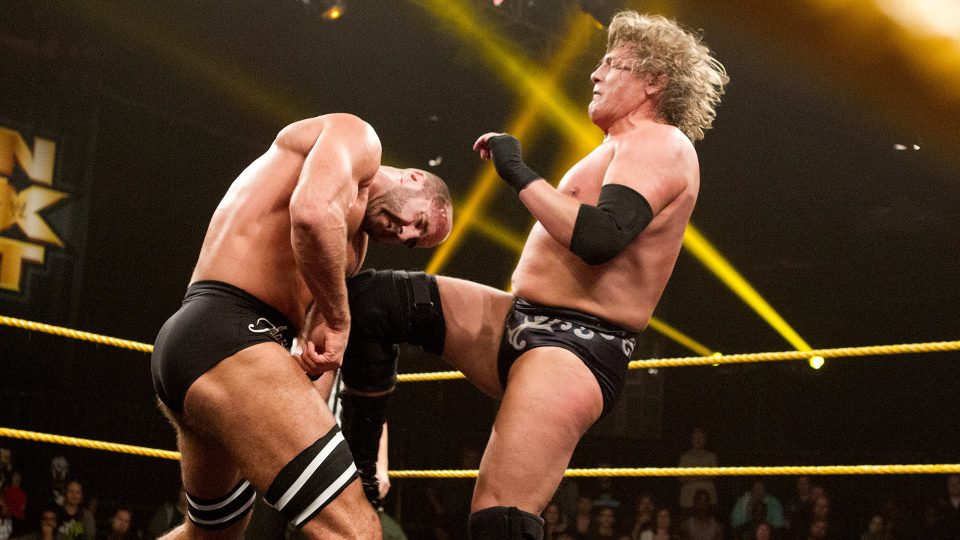 William Regal hitting a Knee Trembler on Cesaro in WWE NXT