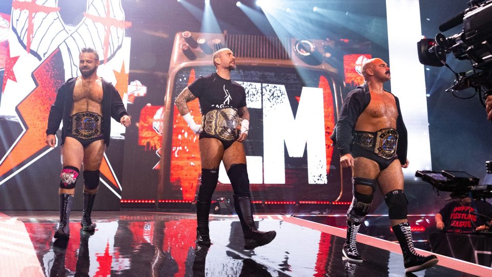 CM Punk and FTR make their entrance during an episode of AEW Collision