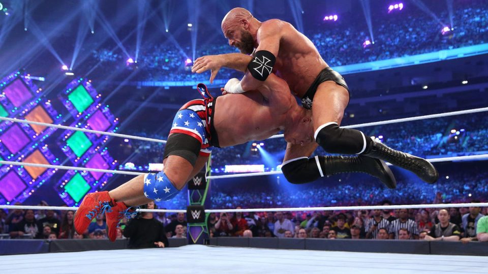 Triple H hits Pedigree on Kurt Angle