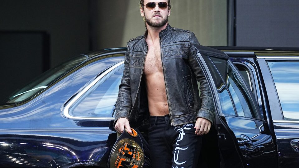 Jack Perry at AEW All In with a car with REAL GLASS