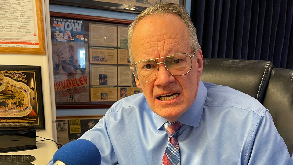 Jim Cornette looking at the camera looking angry